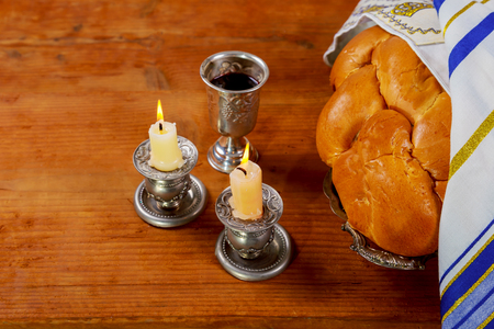 Shabbat Shalom - Traditional Jewish Sabbath ritual challah bread, wineの写真素材