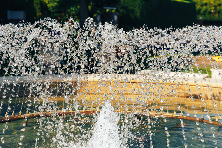 fragment of fountain water drops in the air Fountain of water drops fragment of fountain water drops in the air Fountain of water drops