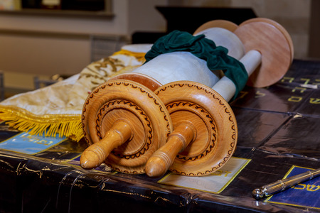 Torah scroll background Hebrew handwritten Torah, on a synagogue alter, with Jewish books of Tora in the synagogueの写真素材