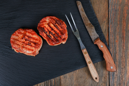 Gourmet Grill Restaurant Steak Menu - New York Beef Steak on Wooden Background. Black Angus Prime Beef Steak. Beef Steak Dinnerの写真素材