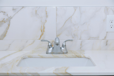 Light bathroom with marble counter top Marble counter New bathroomの写真素材
