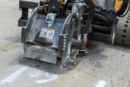 Milling of asphalt for road repair of roads, the removes old asphalt reconstruction accessory for...