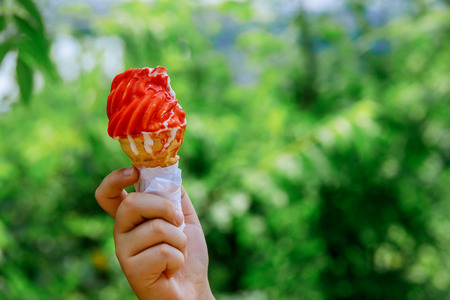 waffle with ice cream in the garden on green grass background