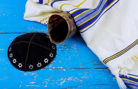 shofar horn kippah and tallit on white prayer talit. rosh hashanah jewish holiday traditional holiday symbol. talisの写真素材