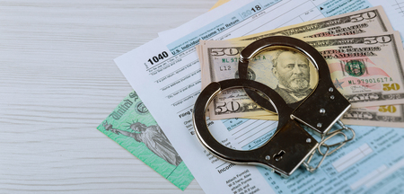 Stimulus economic tax return check with money and refund check