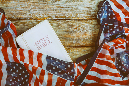 Close-up of Holy Bible, and American Flagの写真素材