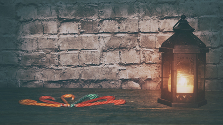 Christmas background with decorations and gingerbread cookies on wooden boardの写真素材