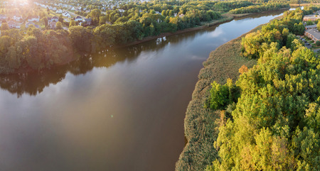 Beautiful aerial view of the forest under clouds during the autumn.