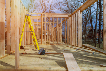 Timber frame house, new build roof with wooden truss, post and beam framework home construction...