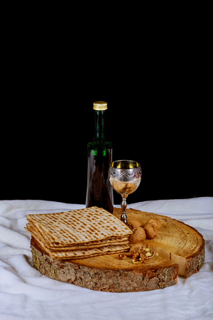 Jewish Matzah on Decorated Silver wine cup with matzah, Jewish symbols for the Passover Pesach...