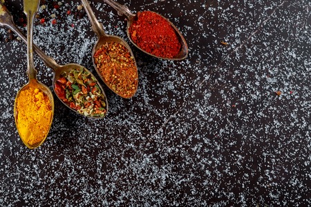 Flat lay overhead view herb and spices assorted powder mix food spices closeup.の写真素材