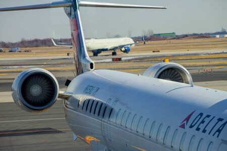FEB 14, 2019 JFK NEW YORK, USA: Passenger plane turbine of an modern airliner DELTA aircraft at the John F. Kennedy International Airportのeditorial素材