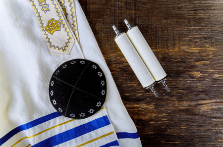 Jewish religion holiday with torah, kippa and talith
