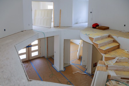 Interior construction of housing with drywall installed door for a new home before installingの写真素材