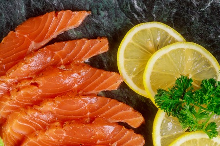 Delicious of healthy food on the plate salmon, lemon nutritious lunch, dinner.