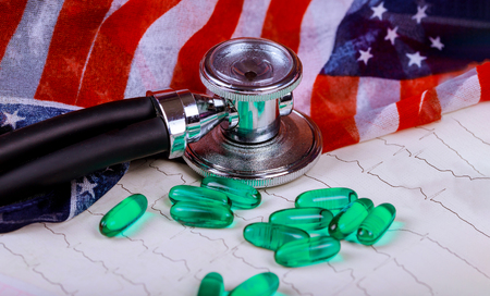 USA background flag and medical stethoscope for drug cardiogram of printの写真素材