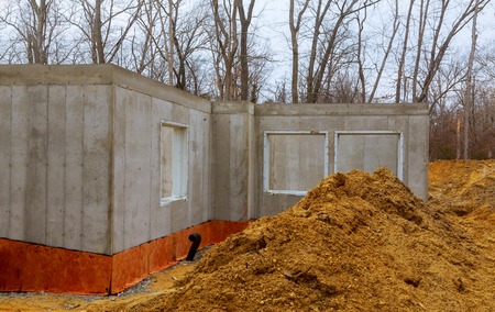 The construction site of a new home poured foundation of concrete construction works