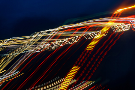 Colorful abstract of lasers rays on a dark background