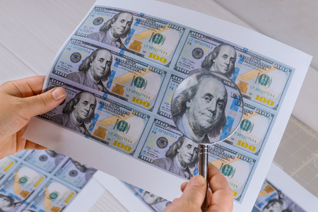 Hundred dollar bill for magnifying glass high security print counterfeiting dollar bills