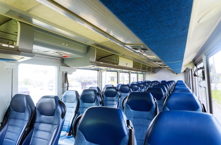 Open double interior of new modern empty chairs busの写真素材
