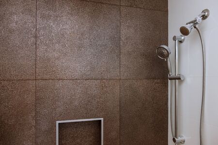 Detail of corner shower cabin with wall mount shower attachmentの写真素材