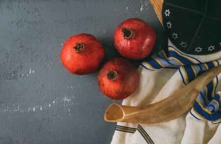 Honey and apples on shofar horn jewish holiday Rosh Hashanah torah book, kippah a yamolka talit