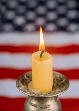 National Patriotic symbols. American flag on remembrance day the candle burnsの写真素材