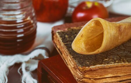 Jewish holiday honey and apples with pomegranate torah book, kippah a yamolka talit jewish Rosh Hashanaの写真素材