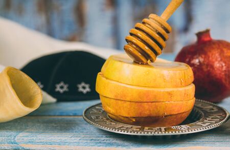 Honey, apple and pomegranate for traditional holiday symbols rosh hashanah jewesh holidayの写真素材