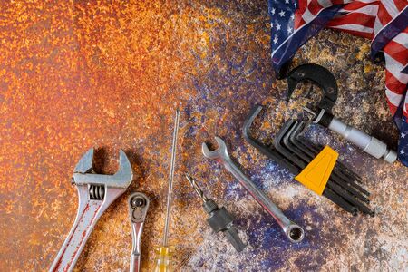 USA flag and construction tools happy Labor day copy space for text on background.の写真素材