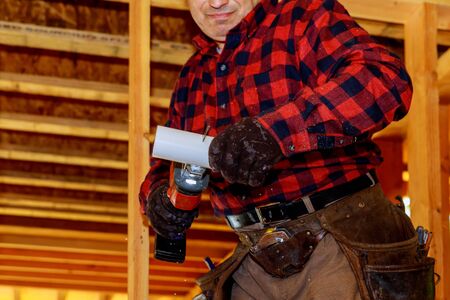 Plumbing using a jigsaw cut pipe for under construction man cutting pipe by sawing machine