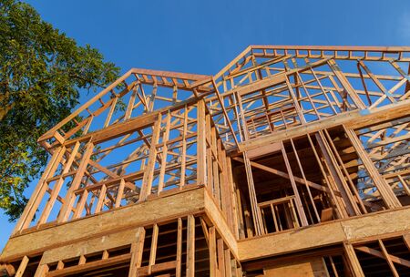 New framing construction home against a blue sky