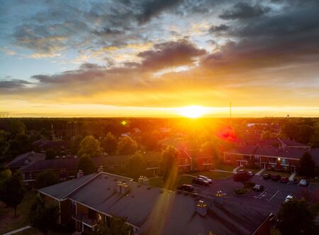 View of the residential area over the roofs of homes a residential suburban district early sunriseの写真素材