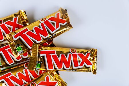 OCTOBER 22 2019 NY USA: Twix candy bars with caramel and milk chocolate made by Mars, Inc. on white backgroundのeditorial素材