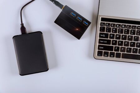 External hard disk and keyboard laptop computer transfer photos