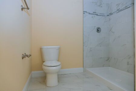 Bathroom with toilet and modern cabinet shower