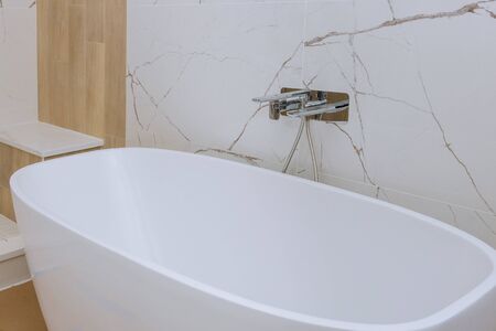 A modern marble tile bathroom with bathtub bathroom during renovations