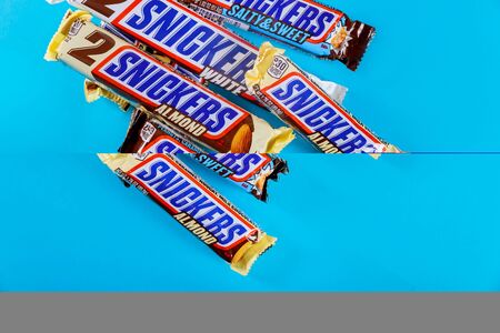 New York NY NOV 08 2019: View of Snickers chocolate bar of snickers maple almond butter candy ang almond butter candy barのeditorial素材