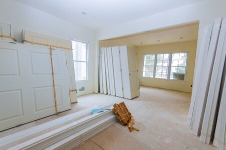 Interior construction of housing project with door and molding installed construction materials