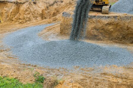 Foundation of the house moving gravel excavator in the construction works