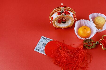 Chinese new year symbol decorations ornament, money packet Ang Pau on red background (Good Luck)の写真素材