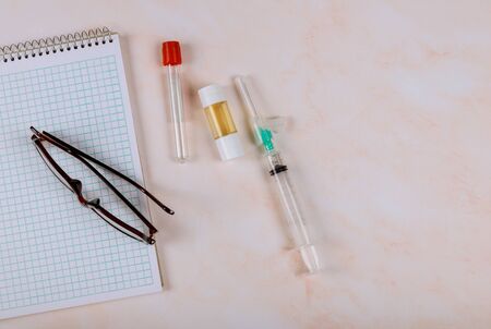 Medical office professionals at glasses over notebook health care professional occupationの写真素材