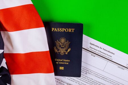US Application for Naturalization documents and US Passport American flag