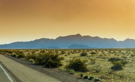 Landscape mountain scene in the morning blue sky view on hill in fogの写真素材