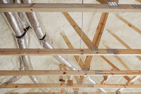 House under construction the roof of air conditioner vents of wooden beams at construction