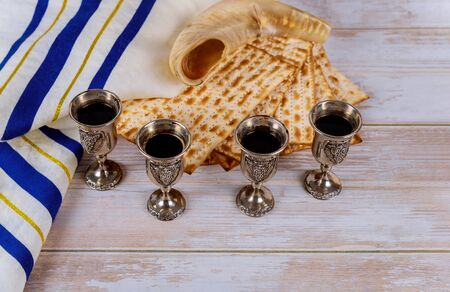 Matzoh jewish holiday red kosher wine with matzah a Passover Haggadahの写真素材
