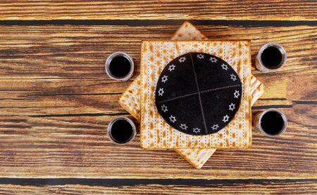 Pesah holiday celebration, matza unleavened bread and four cup kosher wine, jewish Passover holiday