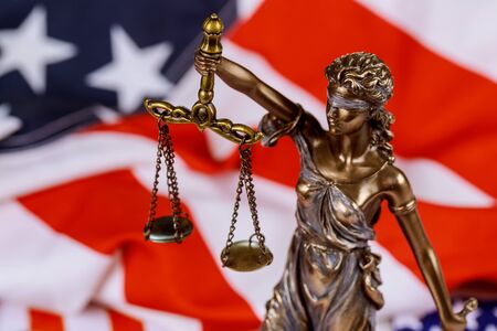 United States of America in Law and Justice statue of Lady Justice with USA flagの写真素材