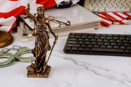 Legal office of lawyers and attorneys legal bronze model statue of metal handcuffs, judge law justice serviceの写真素材