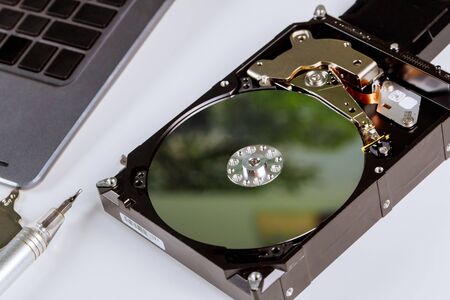 Computer hard drive inside repair and fix in the service center